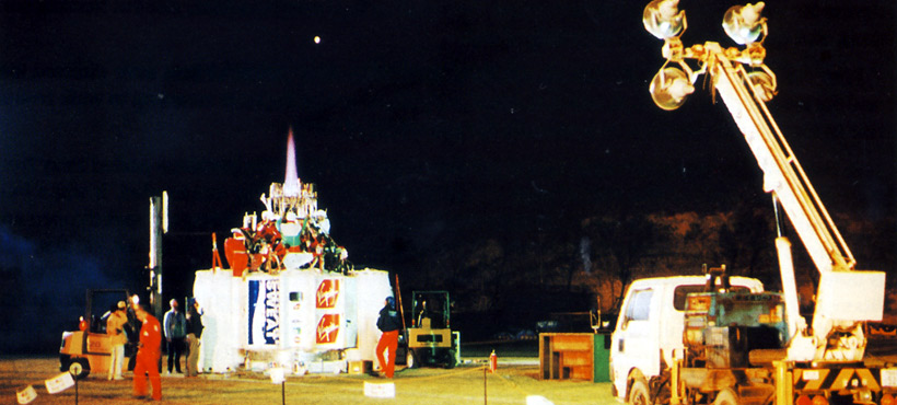 Picture of the arena was like a stage set as the crew acted out their parts under the glare of floodlights